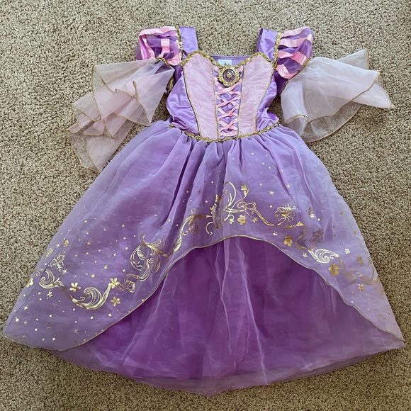 Official Disney Rapunzel dress size 5/6 - Picture 1 of 3